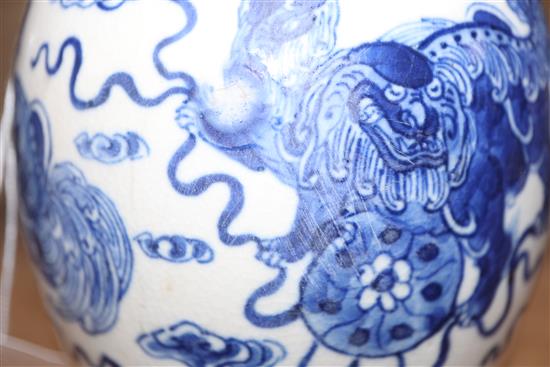 A Chinese blue and white lion-dog jar, Kangxi mark but late 19th century and a 19th century blue and white jar tallest 17cm, lacking